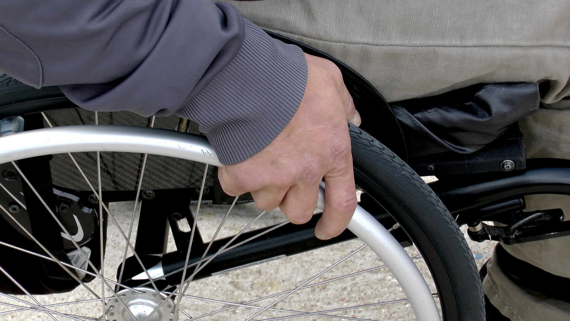 hands on wheelchair